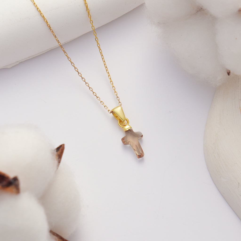14K gold plated 925 sterling silver necklace featuring a genuine natural color-changing diaspore cross pendant on a delicate chain.