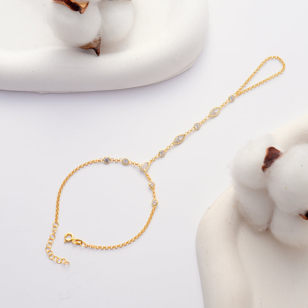 14K Gold Plated Hand Chain Bracelet with Clear Cubic Zirconia on White Background