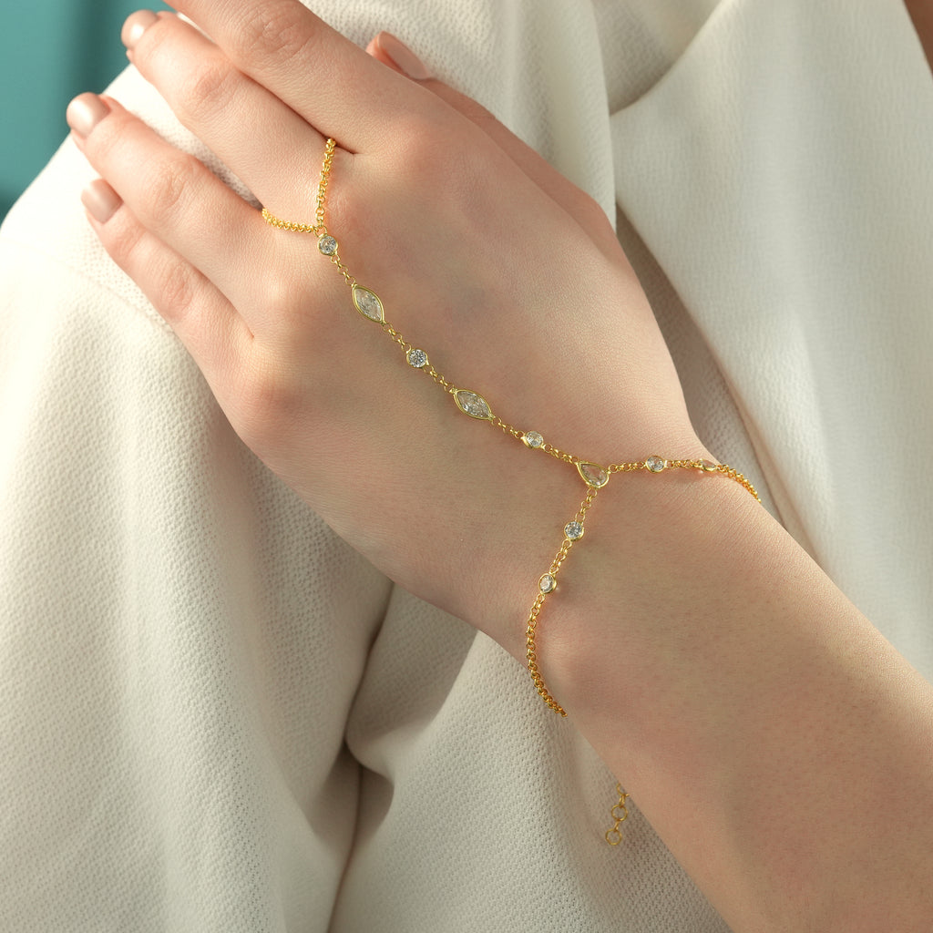 Woman Wearing 14K Gold Plated Hand Chain Bracelet with Clear Cubic Zirconia