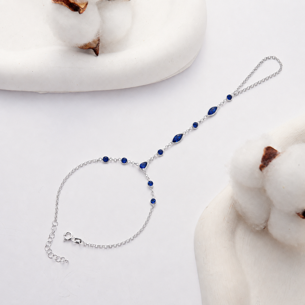 925 Sterling Silver Hand Chain Bracelet with Sapphire Blue Cubic Zirconia on White Background