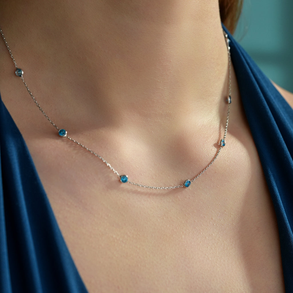 925 Sterling Silver Aquamarine Color CZ Station Necklace