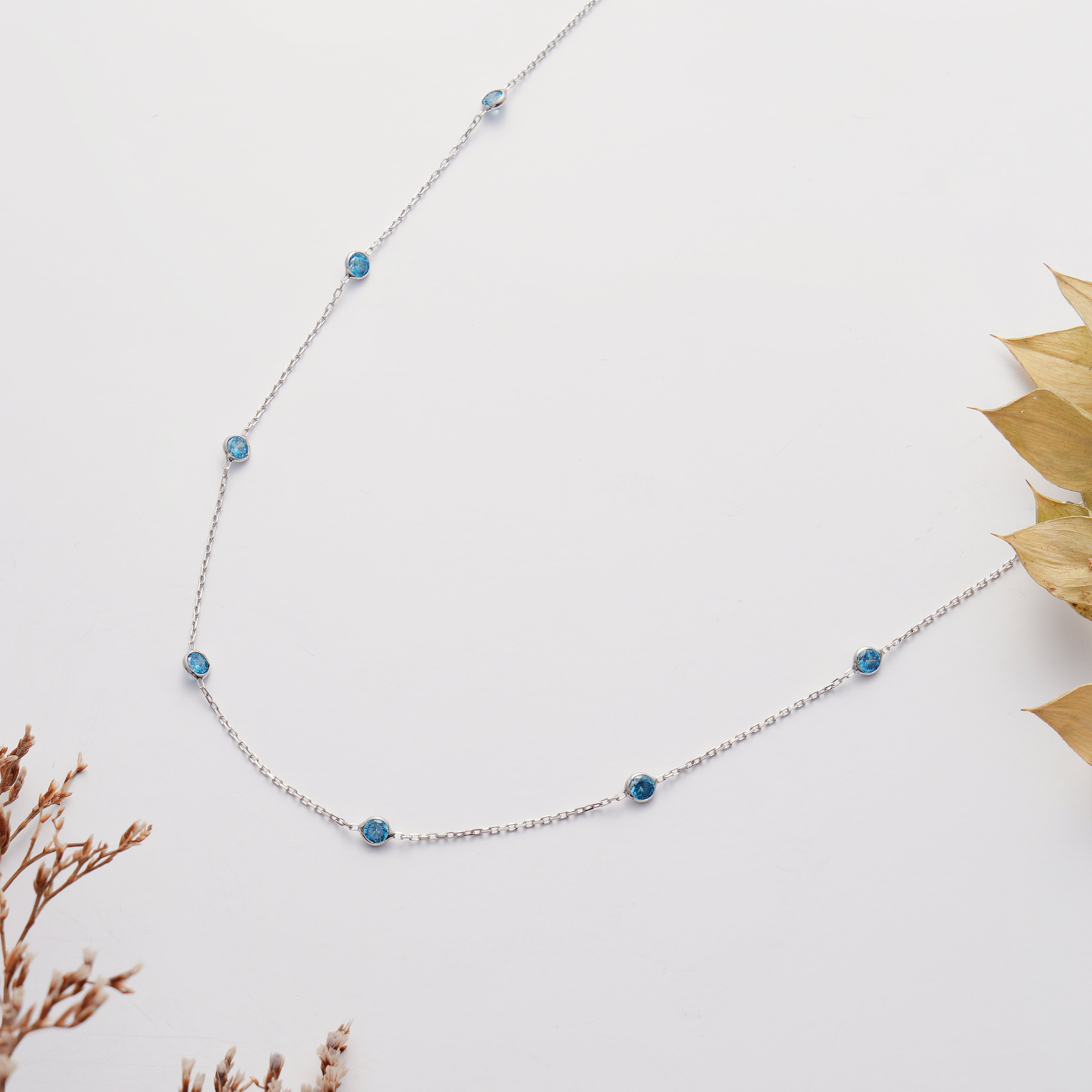 925 Sterling Silver Aquamarine Color CZ Station Necklace